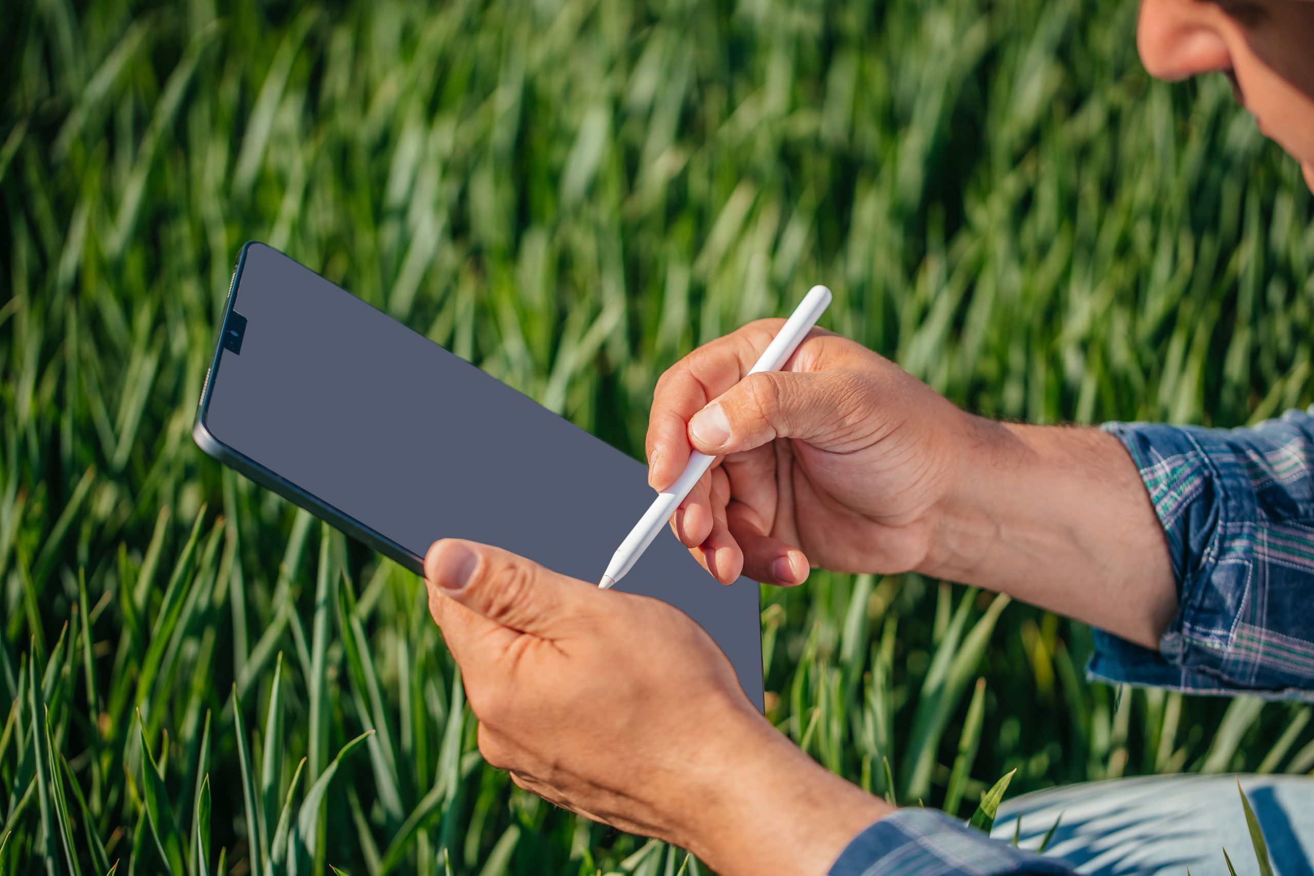 farmer using digital tablet and stylus for precisi 2026 07 14 17 38 52 utc 1 scaled